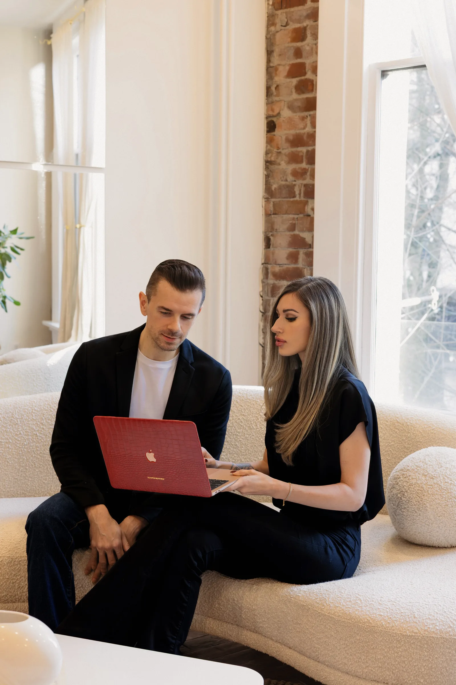 Georgia and Daniel reviewing a business and AI systems audit together